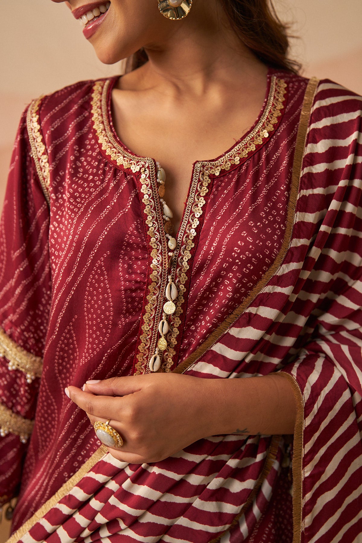 Red Leheriya Bandhani Suit With Potli And Dupatta